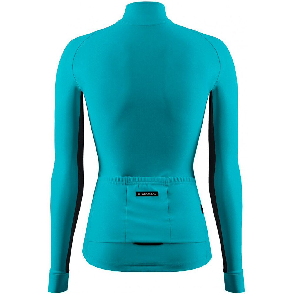 Etxeondo cortavientos ciclismo mujer CHAQUETA UMEA vista trasera